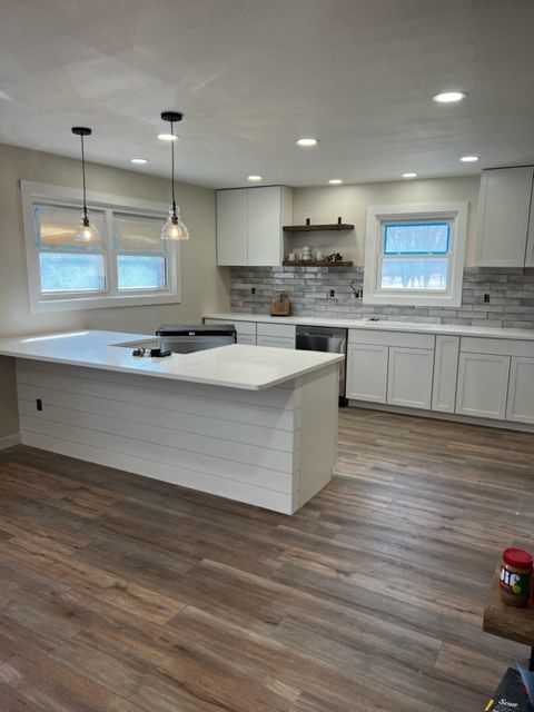 Finished kitchen remodel with luxury vinyl plank