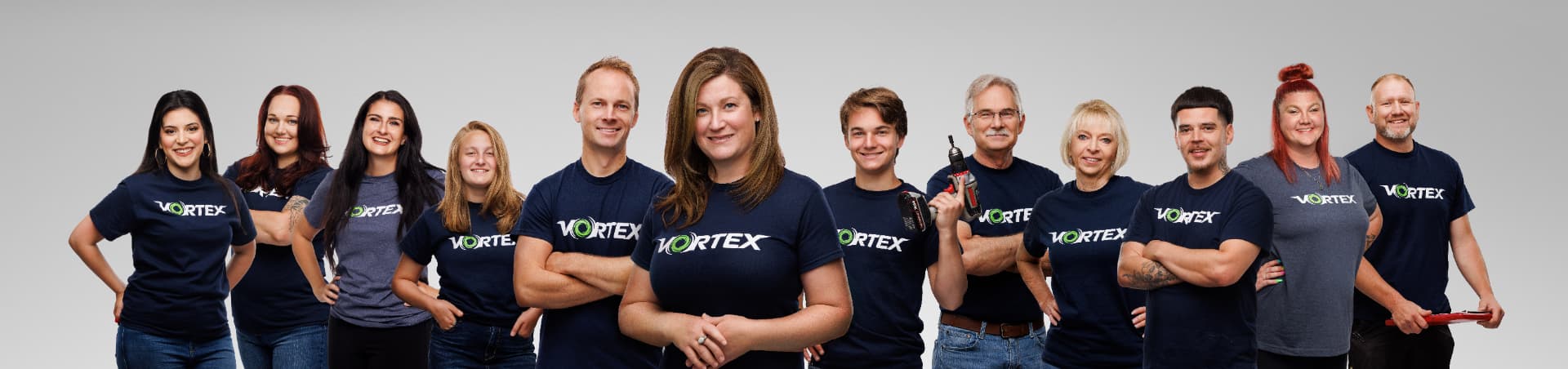 The Vortex Air Duct Cleaning, Restoration and Construction team in Vortex shirts